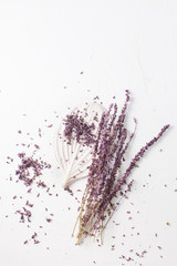Obraz na płótnie Canvas Dried lavender plant on white table