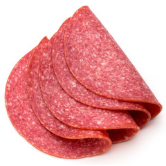 Salami slices isolated on the white background.