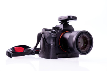 Black DSLR camera with Flash trigger isolated on white background