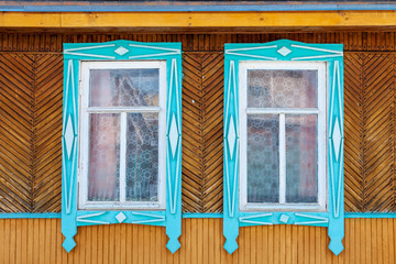 Window in a country house, blue trim
