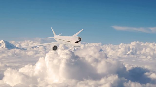 Commercial airplane in flight, plane flying above clouds..