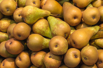 Conference pears in market (background, texture)