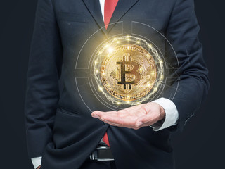 Businessman with hands offers bitcoin concept design.Network worldwide technology connection and make money concept.