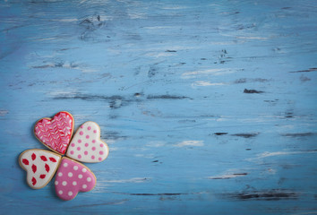 heart shaped cakes on wooden background