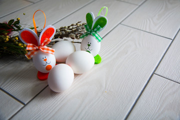 Easter eggs on wooden background. Happy Easter. Creative photo with easter eggs