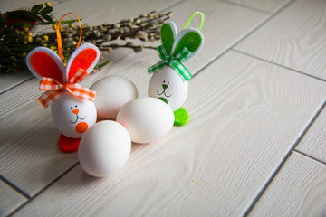 Easter eggs on wooden background. Happy Easter. Creative photo with easter eggs