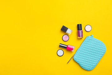 Flat lay composition with cosmetic products on color background