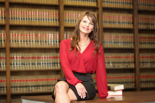 Young attractive, female professional, woman lawyer in law office