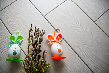 Easter eggs on wooden background. Happy Easter. Creative photo with easter eggs