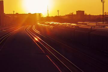 the scarlet sunset at the station, the platform and the cars