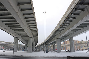 high pillars of the highway over the road