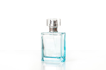 Blue glass perfume bottle mockup, fragrance spray isolated on white