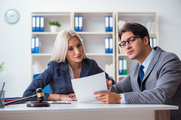 Lawyer discussing legal case with client