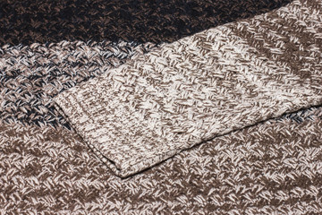  Sweater texture of big knitting. Knitted jersey background with a relief pattern. Wool is hand knitted or machine knitting. Background of fabric.