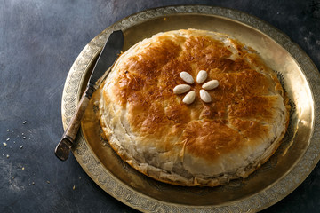 Chicken bastilla, Moroccan layered pie, top view copyspace