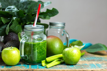 Fresh green vegetables and fruits, ingredients for dietary healthy green detox smoothie or salad copy space