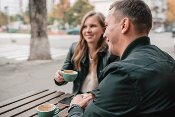 Young beautiful couple walking outdoor