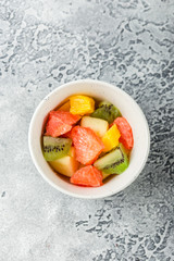 Bowl of healthy fresh fruit salad