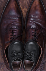 leather brown shoes and children's shoes