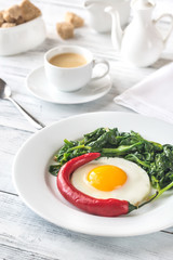 Fried egg with spinach and fresh chilli