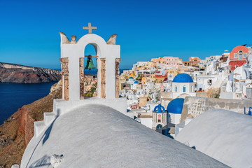 Orthodox church on Santorini Island, Greece. Morning light with blue sky