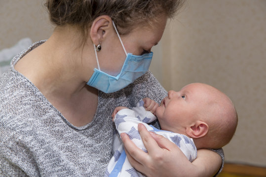 Mom, Who Is Ill, Keeps Her Baby In A Protective Medical Mask