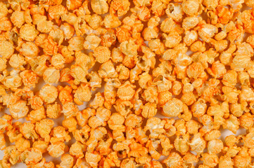 yellow delicious roasted popcorn cover the surface