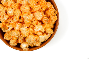 yellow delicious roasted popcorn in a clay brown plate