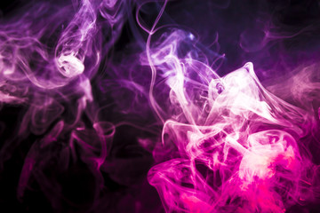 Colored smoke on black background