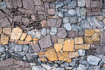 Stone wall made of slate and granite.