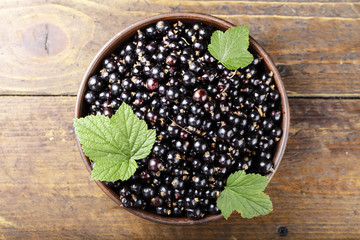 currant on a wooden background