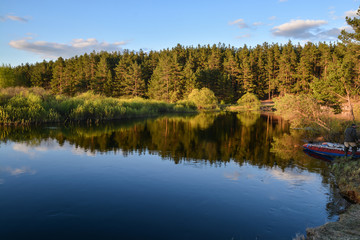 Fototapeta premium May evening on the forest river.