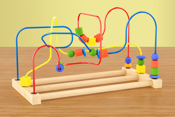 Wooden bead maze, educational toy on the wooden table. 3D rendering