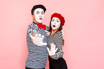 No, hand ban, fear. Portrait of scared young adult couple