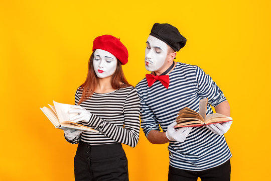 Two students holding book and ready to importrant exams