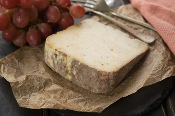 Tasting of ancient french demi soft cheese Tomme from French Alps, made from cow, goat or sheep skim milk, low fat french cheese