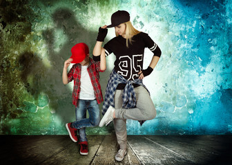 Mother and son dance hip-hop.Urban lifestyle. Hip-hop generation.