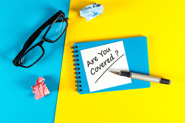 ARE YOU COVERED Question message at your workplace. Are you insured for your car, travel, home, health or other liability