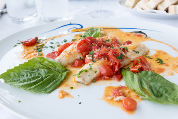Cod with tomato and basil