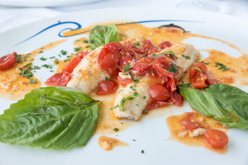 Cod with tomato and basil