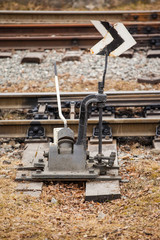 Fototapeta na wymiar old mechanism of moving the arrows of the rail