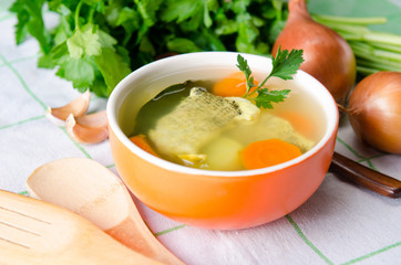 Fish soup served on the table in plate