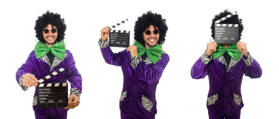 Funny man in wig with clapper board isolated on white