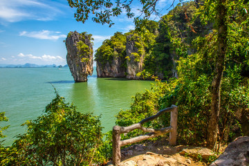 Fototapeta na wymiar James Bond island near Phuket in Thailand. Gorgeous scene in Tapu island.The beach and fishing boats.James Bond Island Phangnga Thailand.