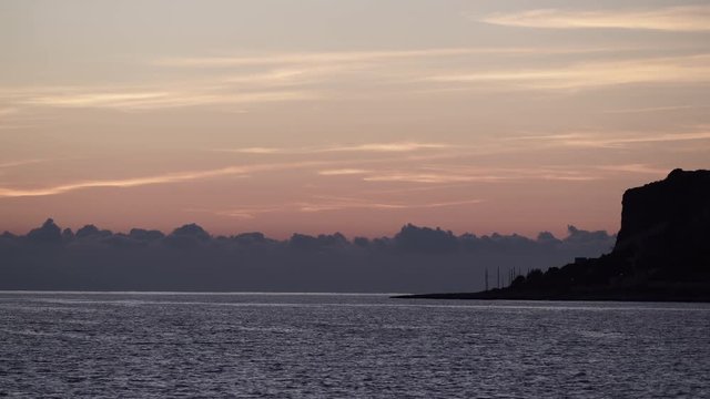 Sky after sunset over sea water surface, Greece Peloponnese