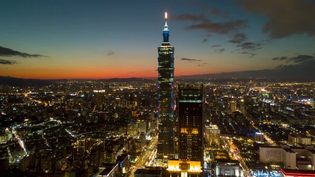 sunset night illuminated taipei tower downtown aerial panorama 4k timelapse taiwan
