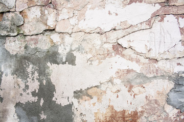 Crack wall brick plaster texture. Old abstract broken architecture background. Scratched stucco. For banner and wallpaper.