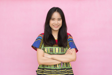 Portrait beautiful Asian girl in casual wear isolated on pink background