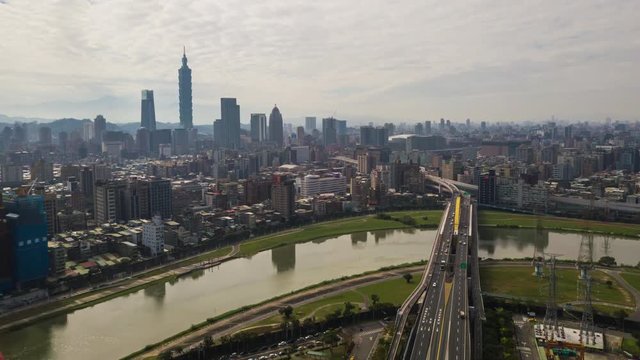 sunny day taipei cityscape river traffic bridge aerial downtown panorama 4k timelapse taiwan
