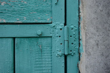 Old plank wooden wall background. The texture of old wood. Weathered piece of wood.